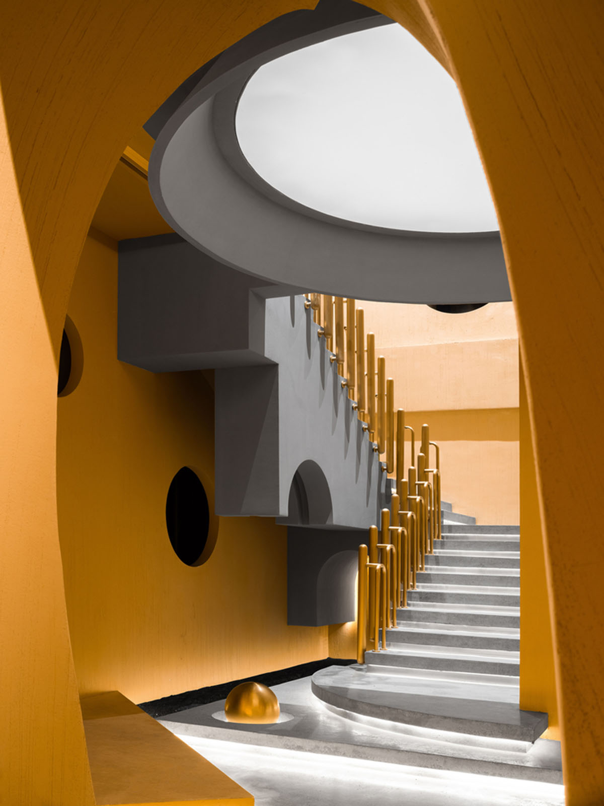 Angular corrugated stainless steel sheets form this showroom designed by PIG DESIGN in Hangzhou