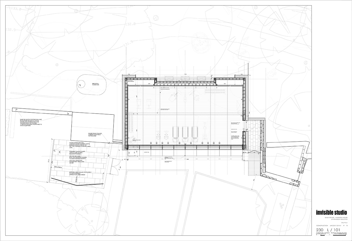 Invisible Studio creates large window for a gymnasium overlooking to a productive garden in Somerset