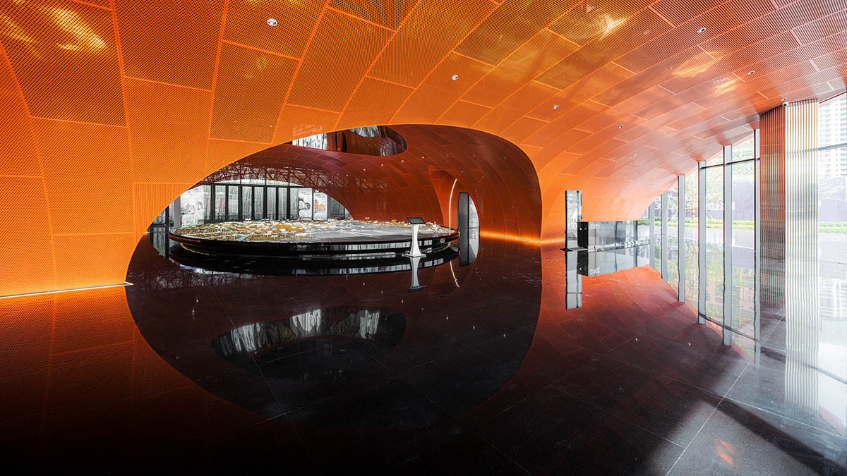 Wutopia Lab built showroom evoking Chinese red mountains with dazzling orange-colored roof