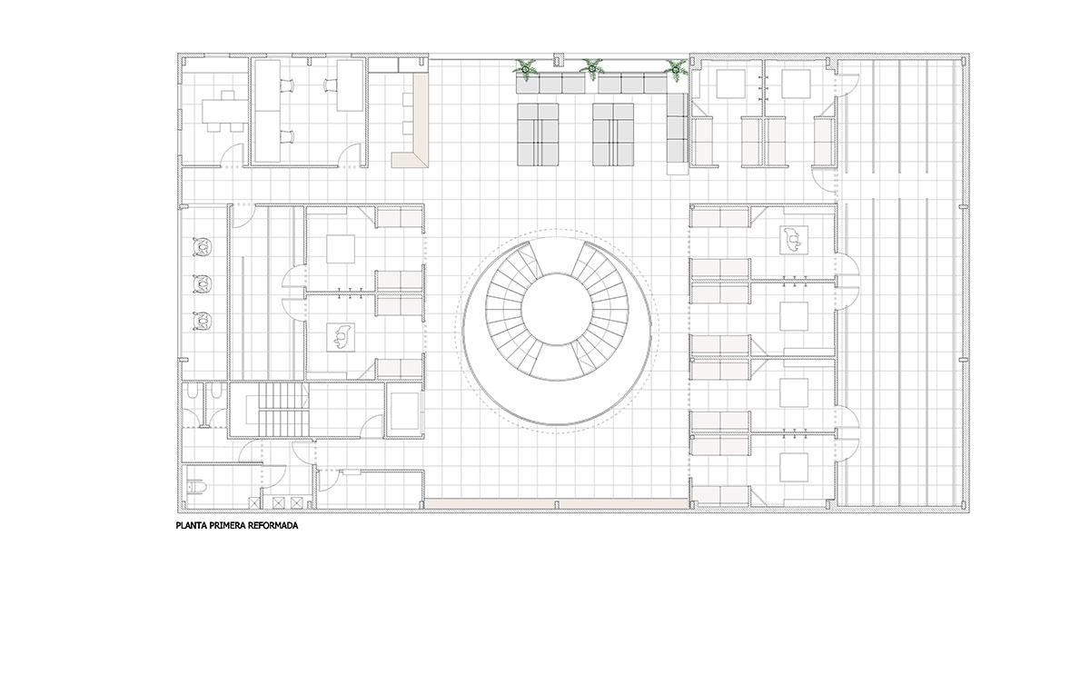 Pablo Muñoz Payá Arquitectos converts old industrial building into bridal store with golden interior