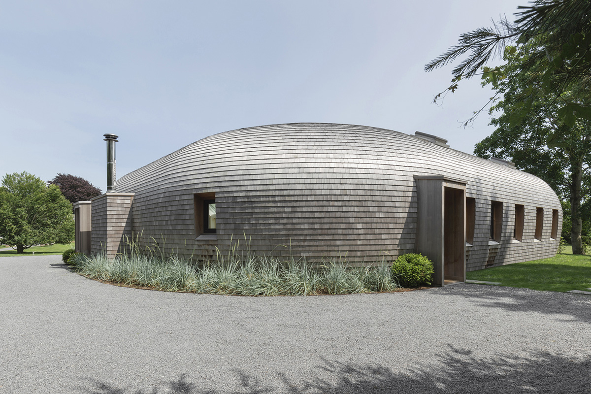 nea studio's cocoon-shaped residence in Long Island acts as a