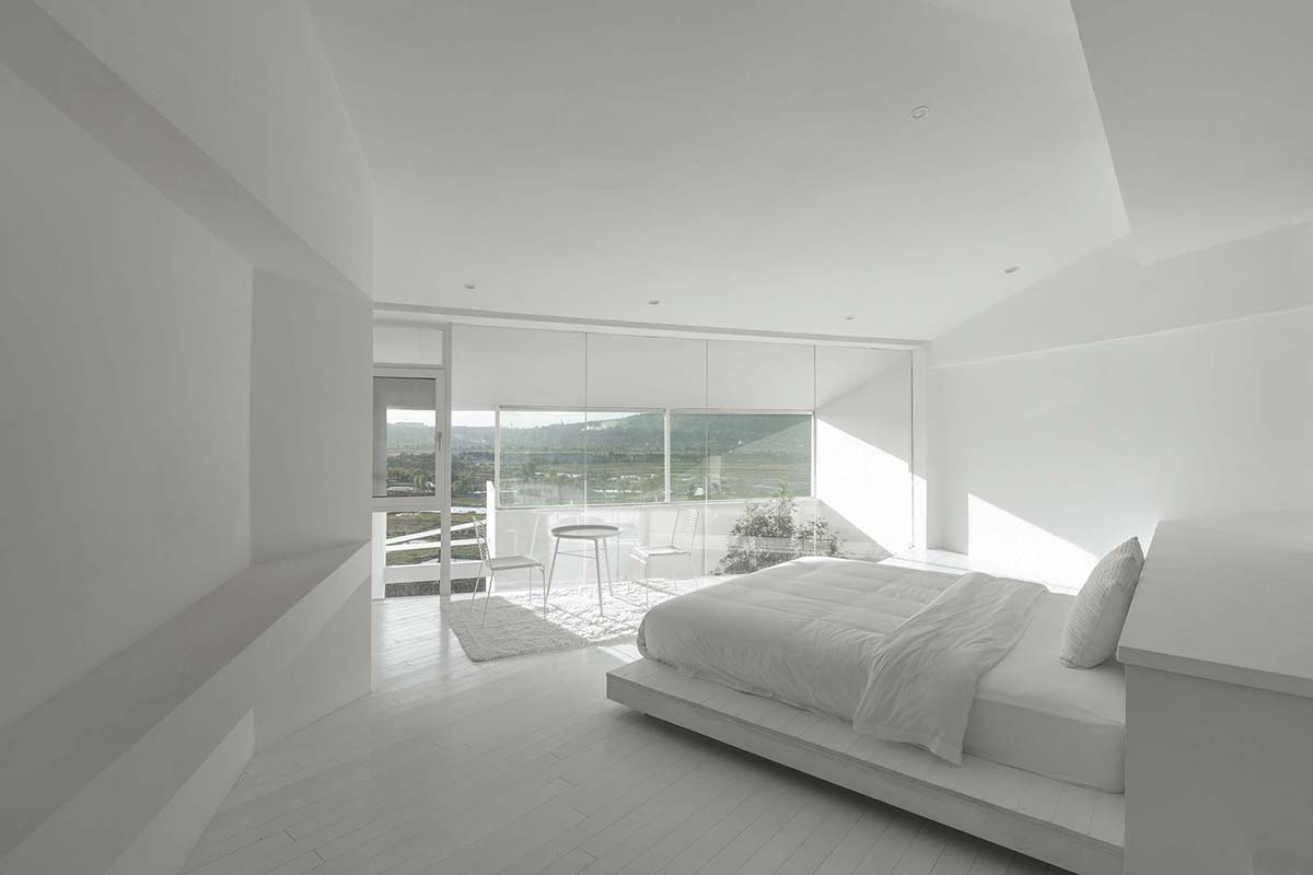 STUDIO QI reinterprets sequence of living conditions with tilted hotel on a hilly plot in China
