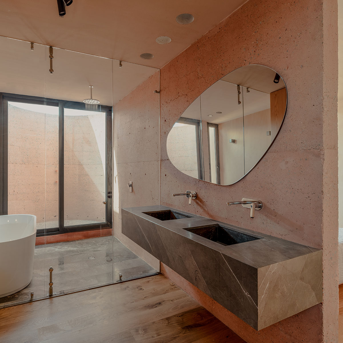 Taller Segovia Molina enriches beige Casa Aguilar with interior patios and an abundance of light