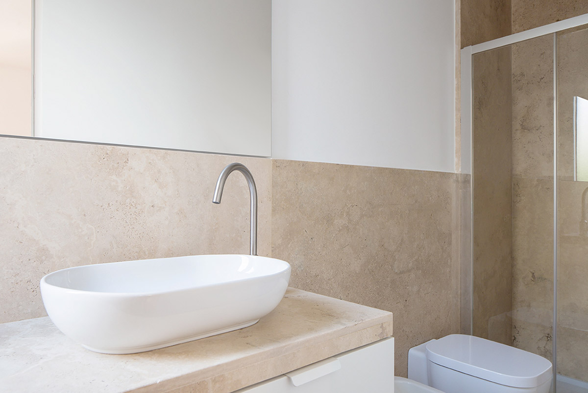 Margine renovates 1950s apartment with minimalist color palette and tiny furnitures in Rome