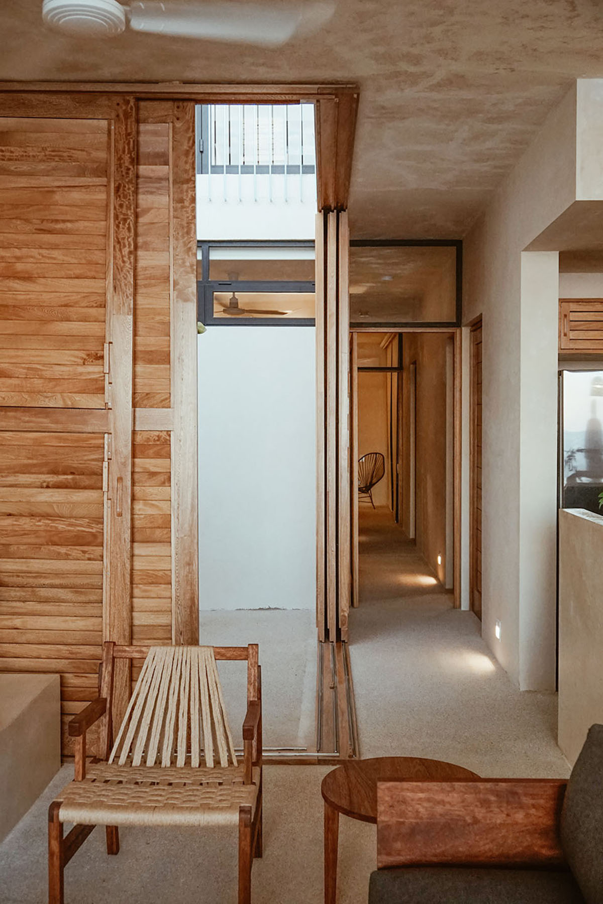 Francisco Pardo Arquitecto's housing features circular  pool overlooking the coastal landscape