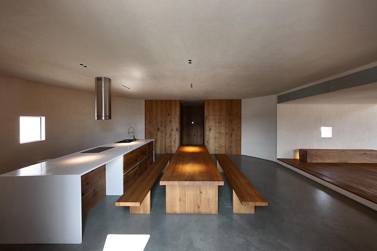 ZMY Design creates earth-toned interiors for a woodwork enthusiast’s house in Fujian, China