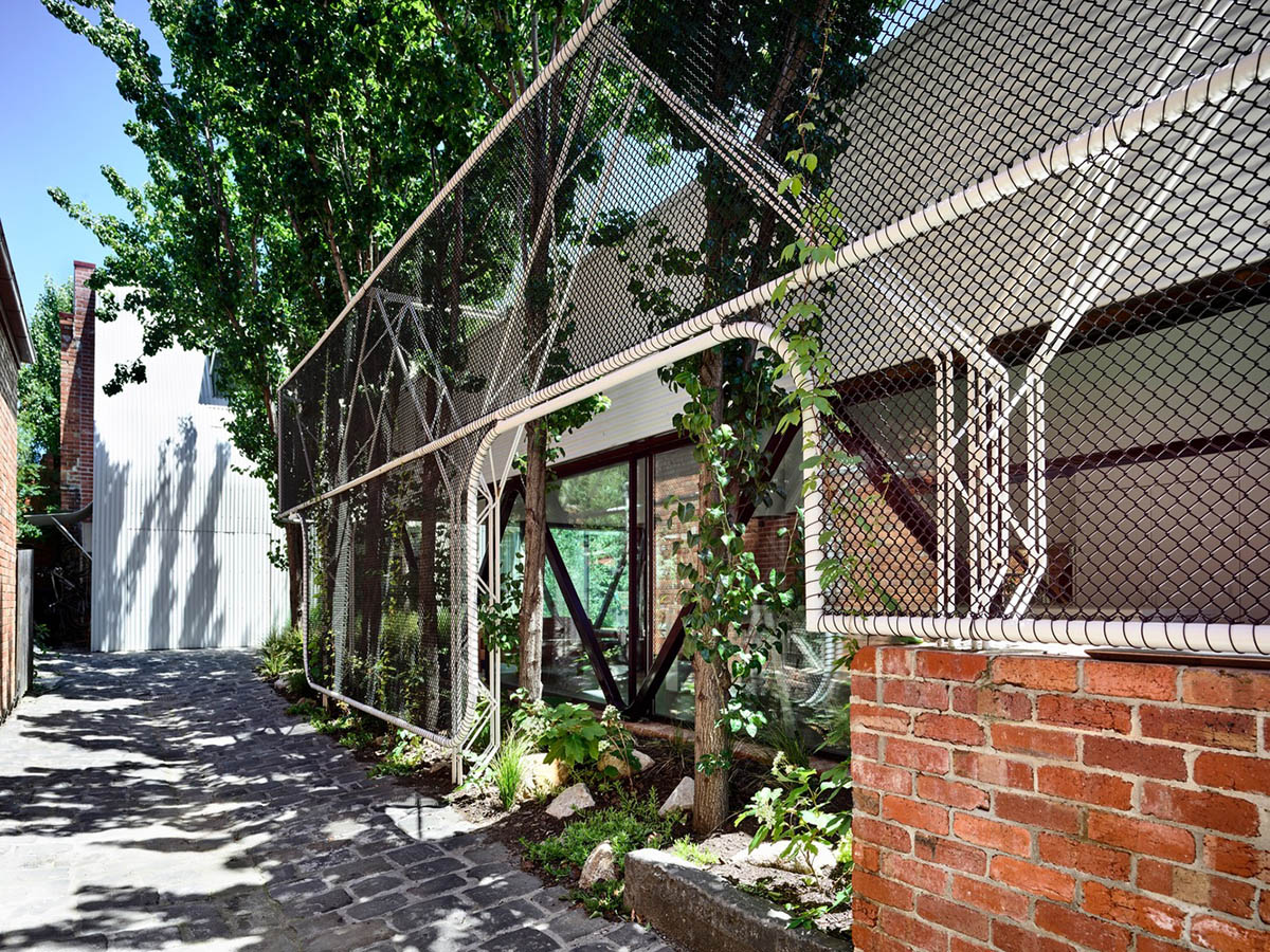 Austin Maynard Architects extends existing terraced home with corrugated steel pavilion