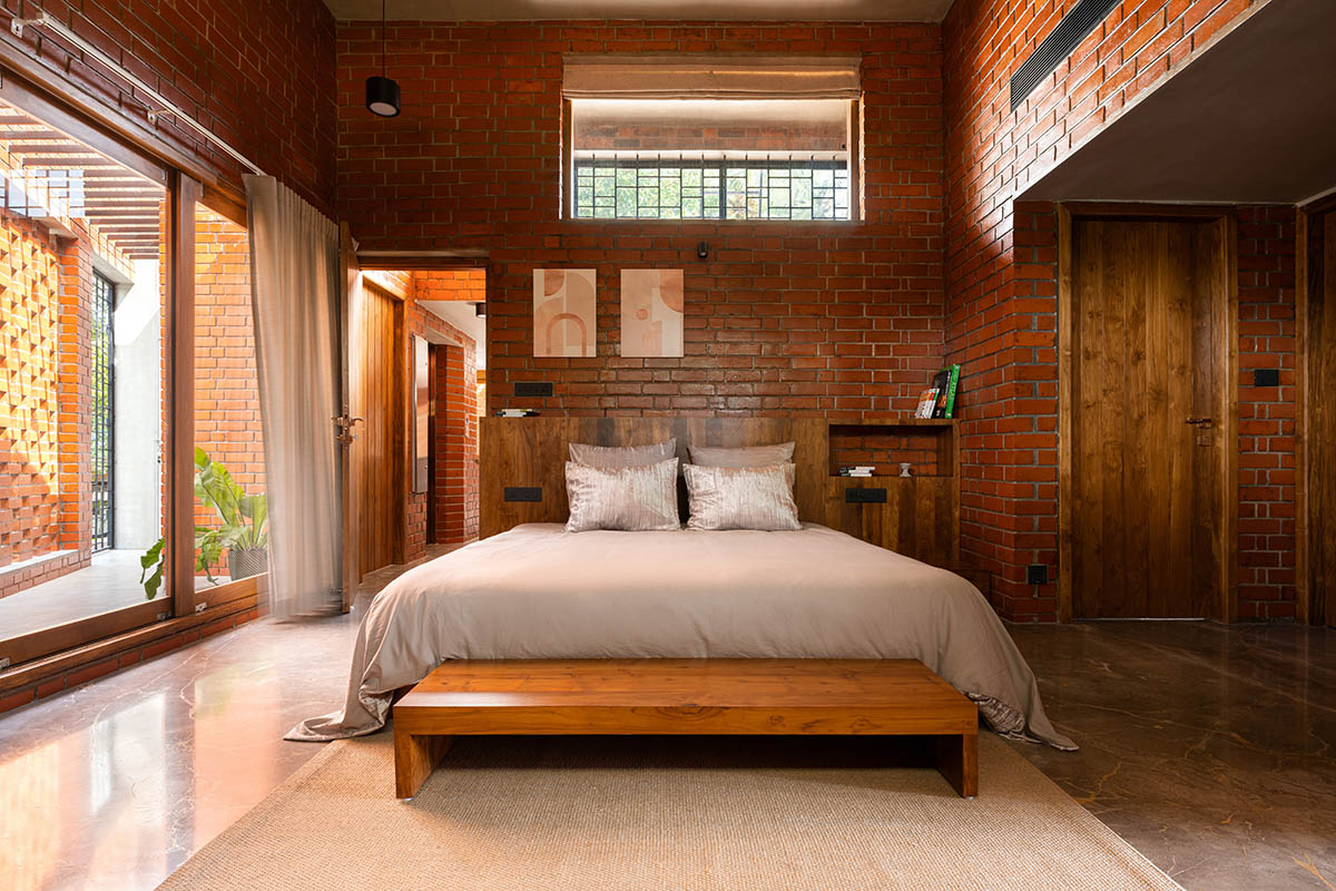 Srijit Srinivas - ARCHITECTS built brick family house with angled triangular façade in Kerala