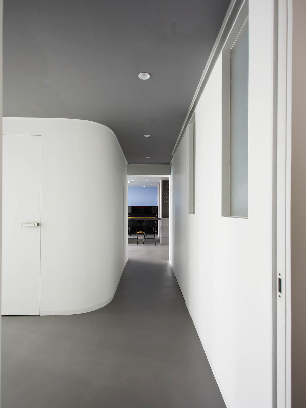 XIGO STUDIO creates gray and blue-colored interiors for apartment in Beijing 