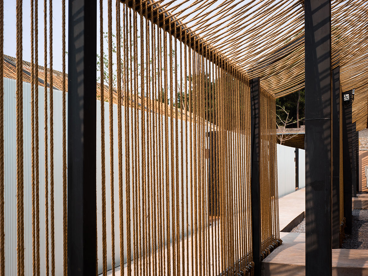 Domain Architects built boutique hotel with thatch roof and 60,000-metre hemp rope in rural Beijing
