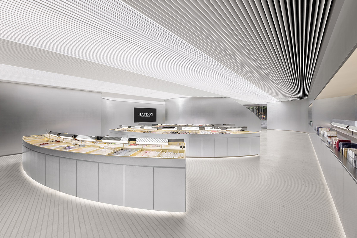 Various Associates designs beauty store with winding staircase and silver-toned interiors in Hangzhou