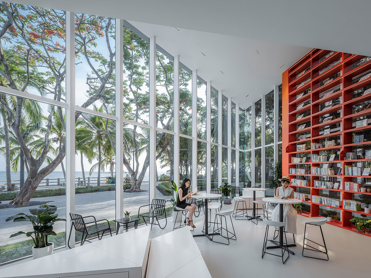 Wutopia Lab elaborates bookstore with red triangular bookshelves for Tianya Books in China 