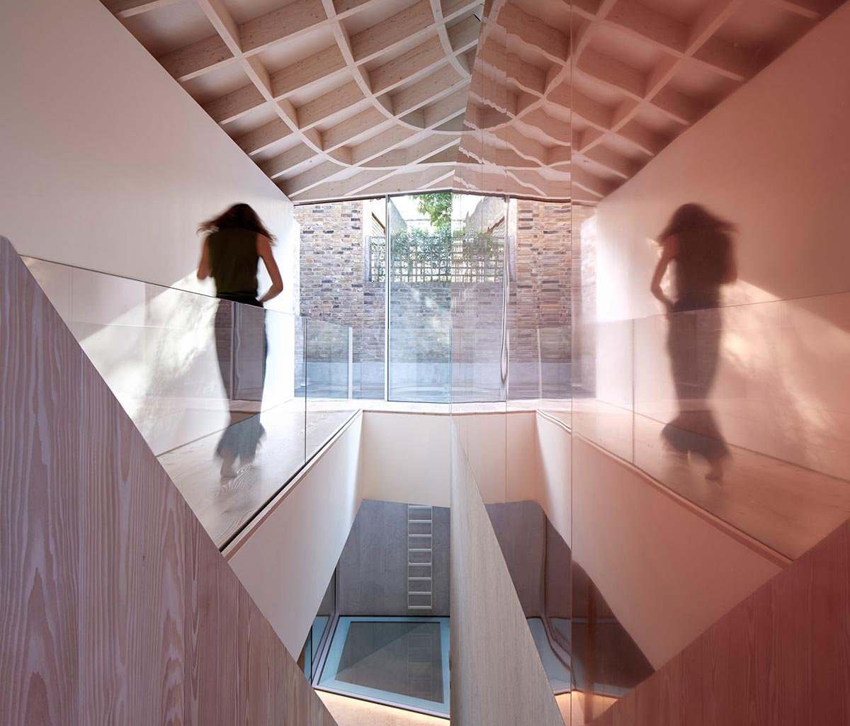Gianni Botsford Architects transforms dilapidated bungalow with a giant copper clad roof in London