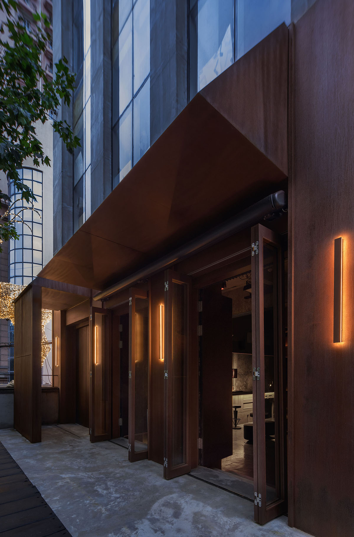 All Design Studio uses bold elements and soft lighting to create Lieben Bar in Shanghai