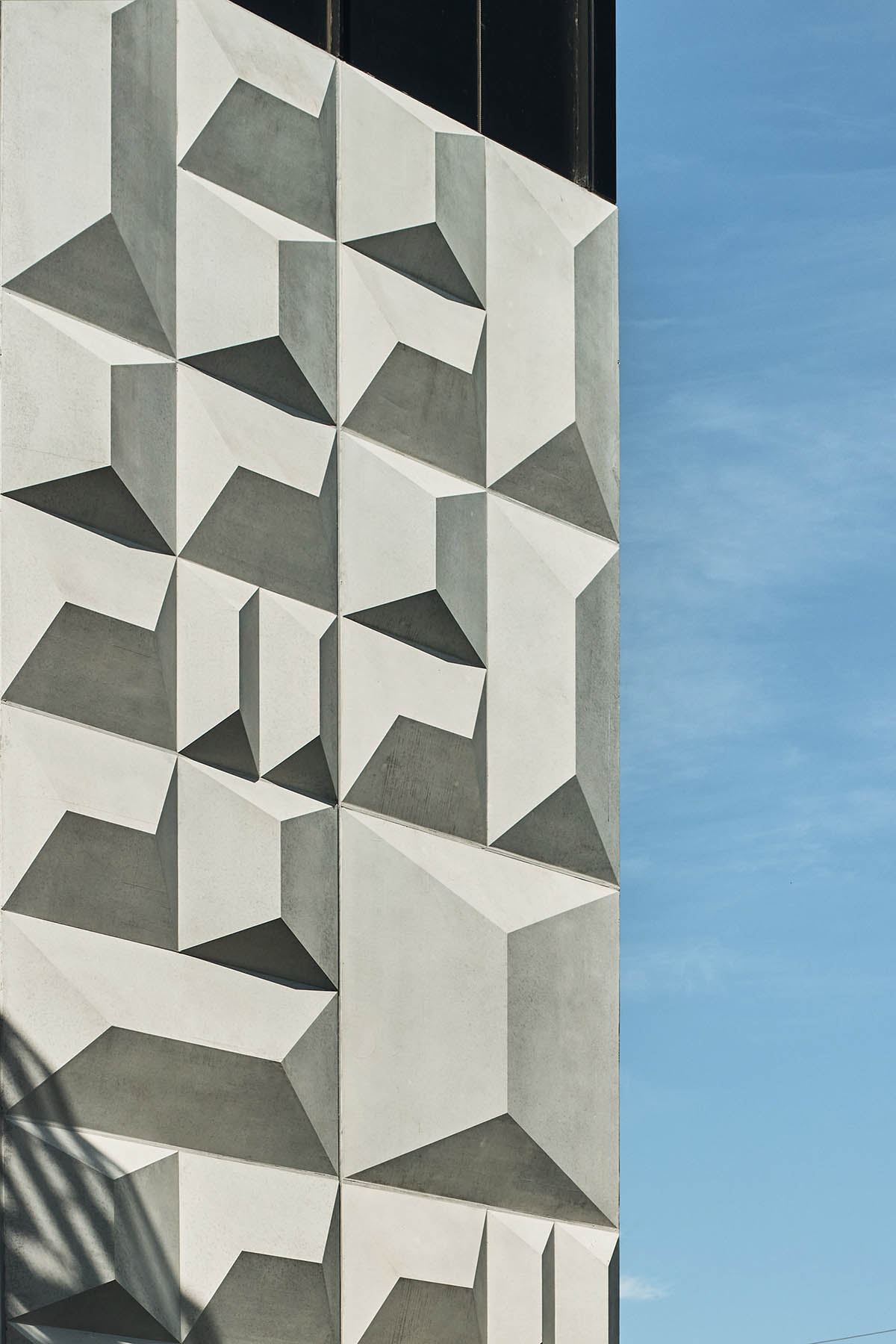 Wood Marsh abstracts Darebin’s roofscape into a 3D concrete pattern for Bell and Preston Stations