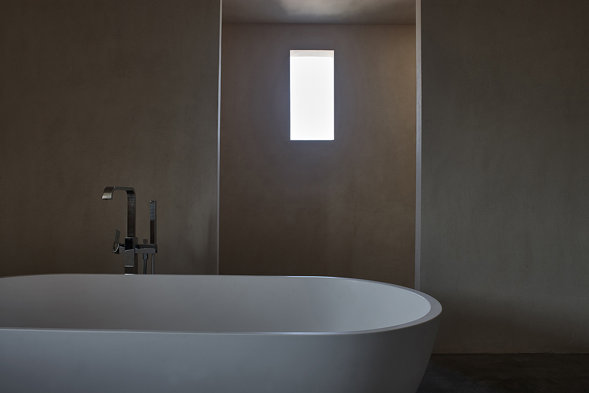 ZMY Design creates earth-toned interiors for a woodwork enthusiast’s house in Fujian, China