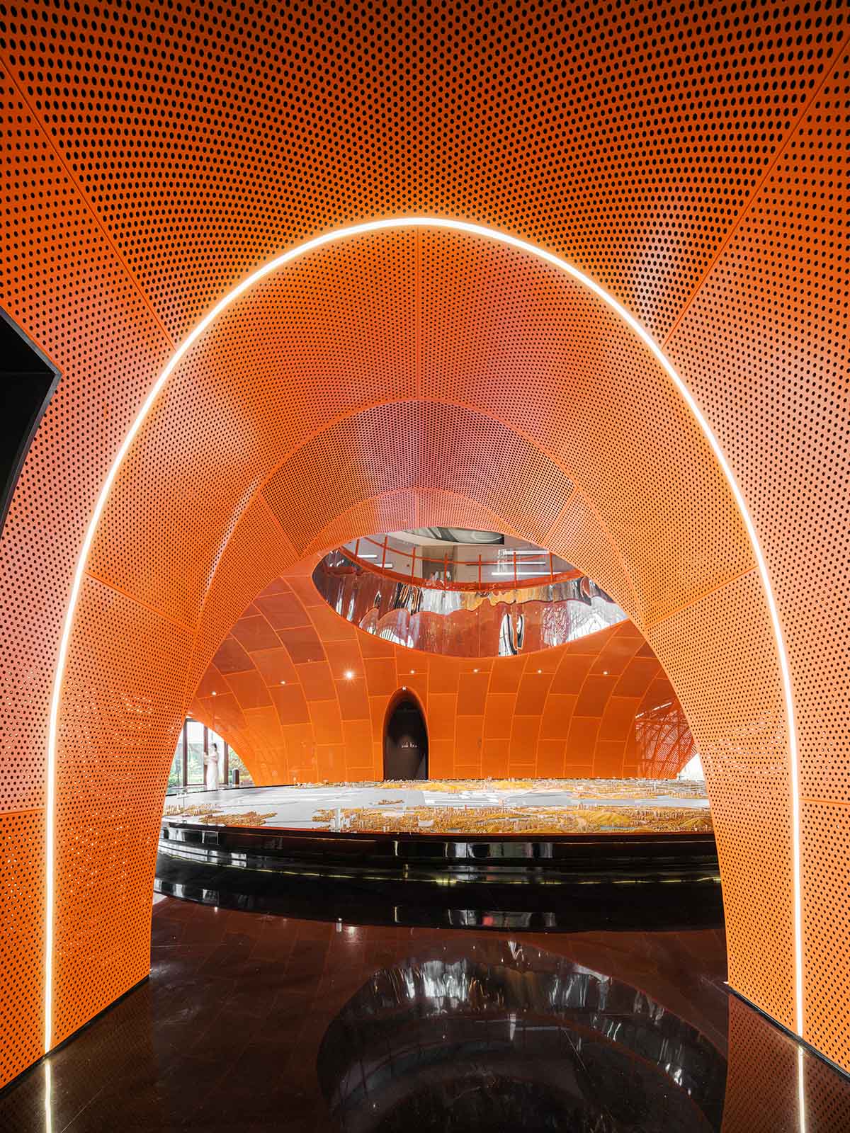 Wutopia Lab built showroom evoking Chinese red mountains with dazzling orange-colored roof