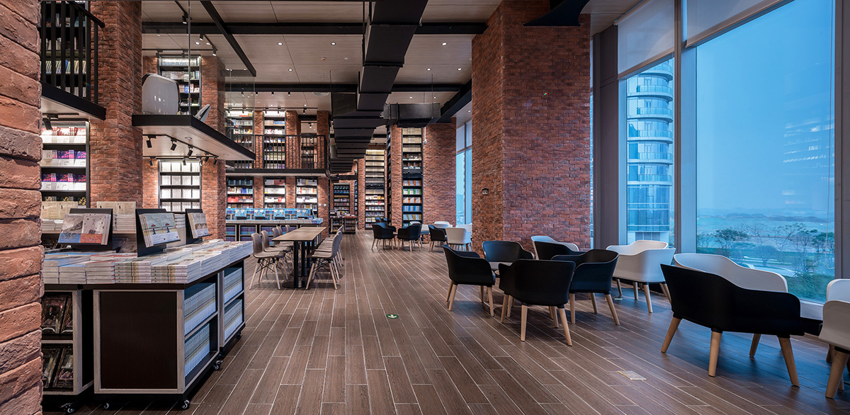 X+Living creates undulating walls and colourful interior for Chengdu Zhongshuge bookstore in China