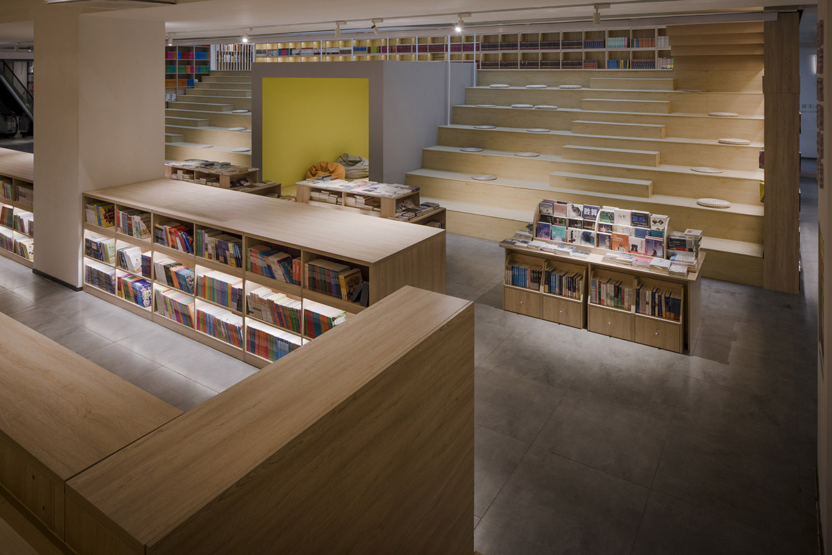 y.ad studio designs Yuanping Meijing Bookstore hidden in daylighting atriums in China