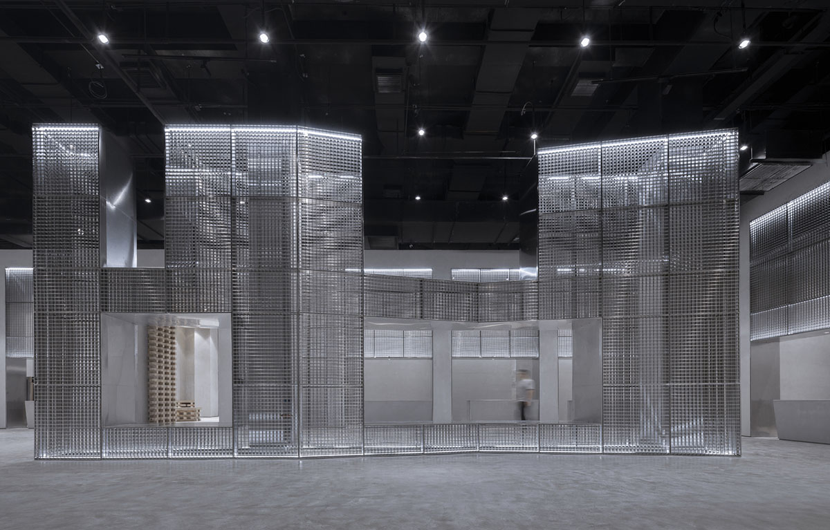 BANDe Architects combines greyscale interior with gridded wooden structures for GreenMonster Lab