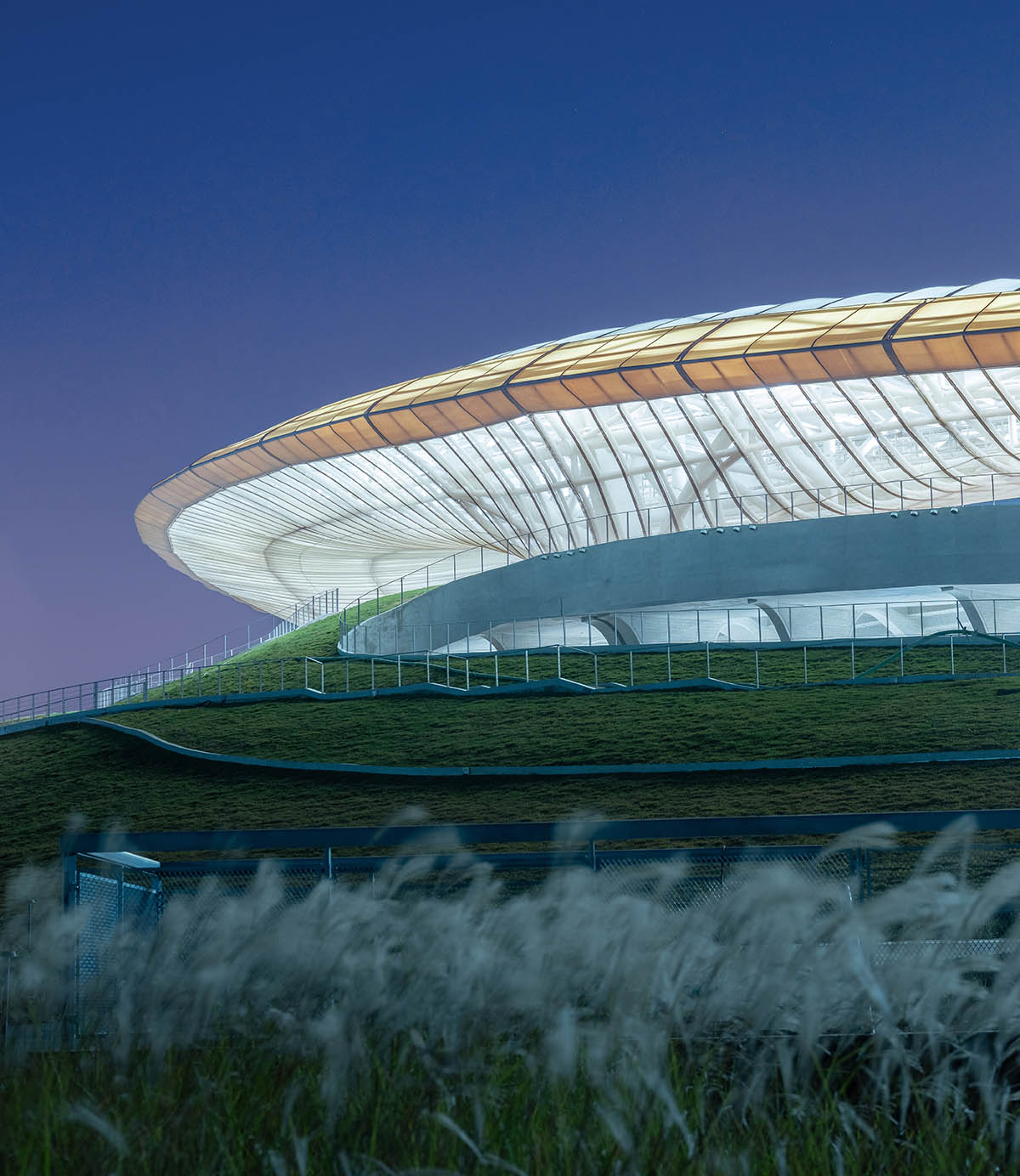 MAD completes the first signature stadium at Quzhou Sports Park crowned by undulating halo-like roof 