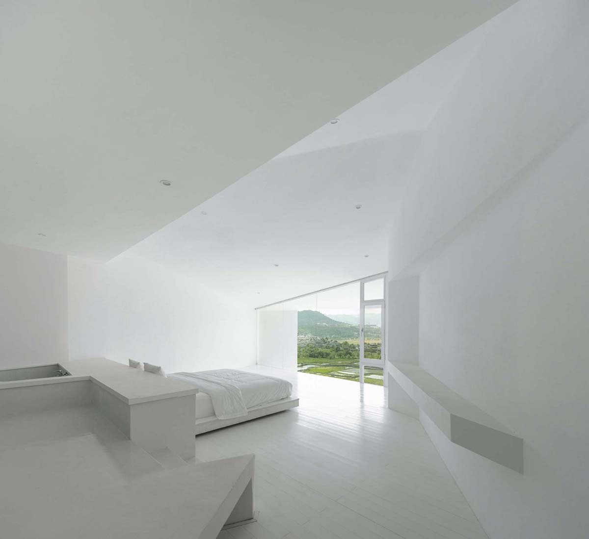 STUDIO QI reinterprets sequence of living conditions with tilted hotel on a hilly plot in China