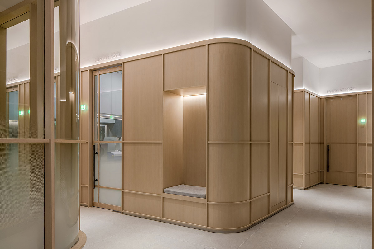 JACKY.W DESIGN completes dental clinic with rounded wooden walls and natural tones in China 
