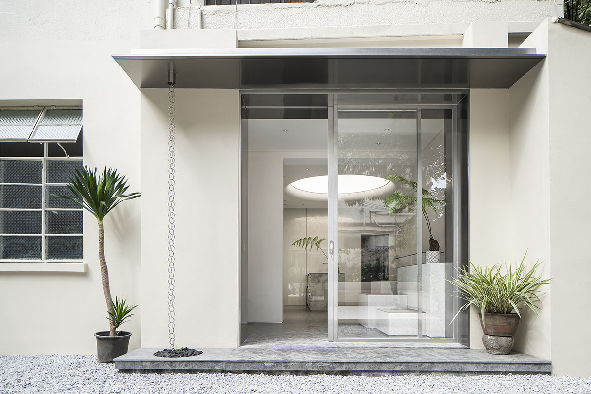 More Design Office's Absolute Flower Shop features cellular spaces with flower arrangements