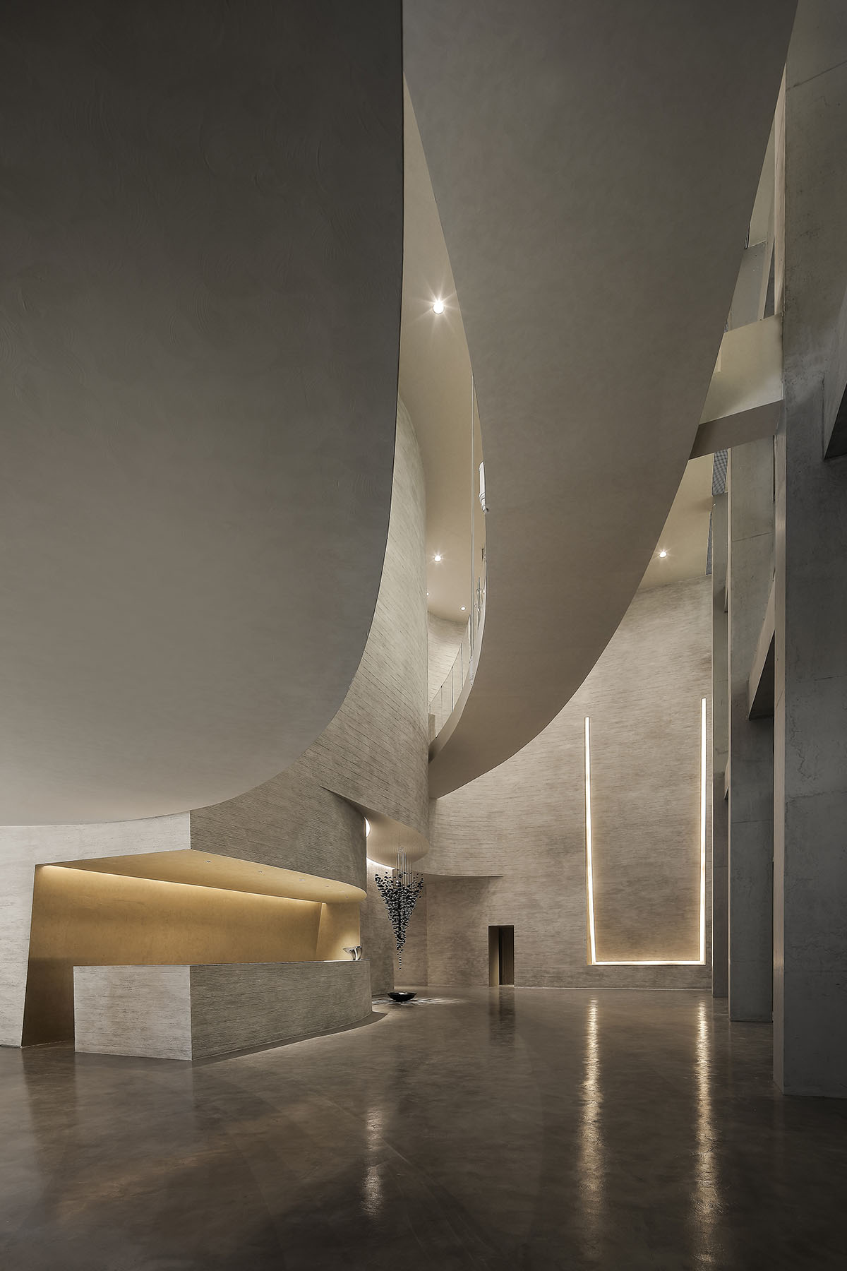 Waterfrom Design's art space features flowing walls to create