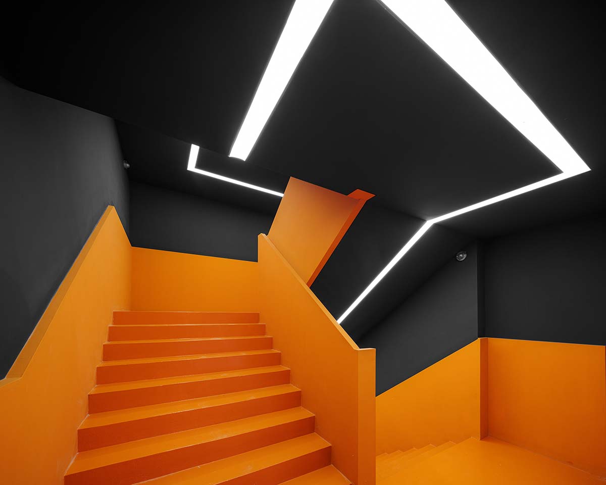 Wutopia Lab built showroom evoking Chinese red mountains with dazzling orange-colored roof