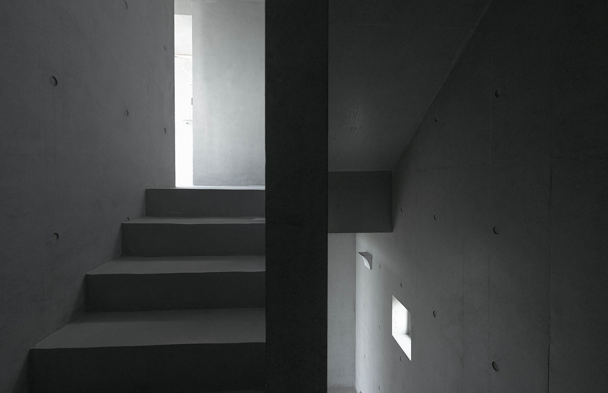 TAO built concrete cafe on a cliff as an extension of the land in China