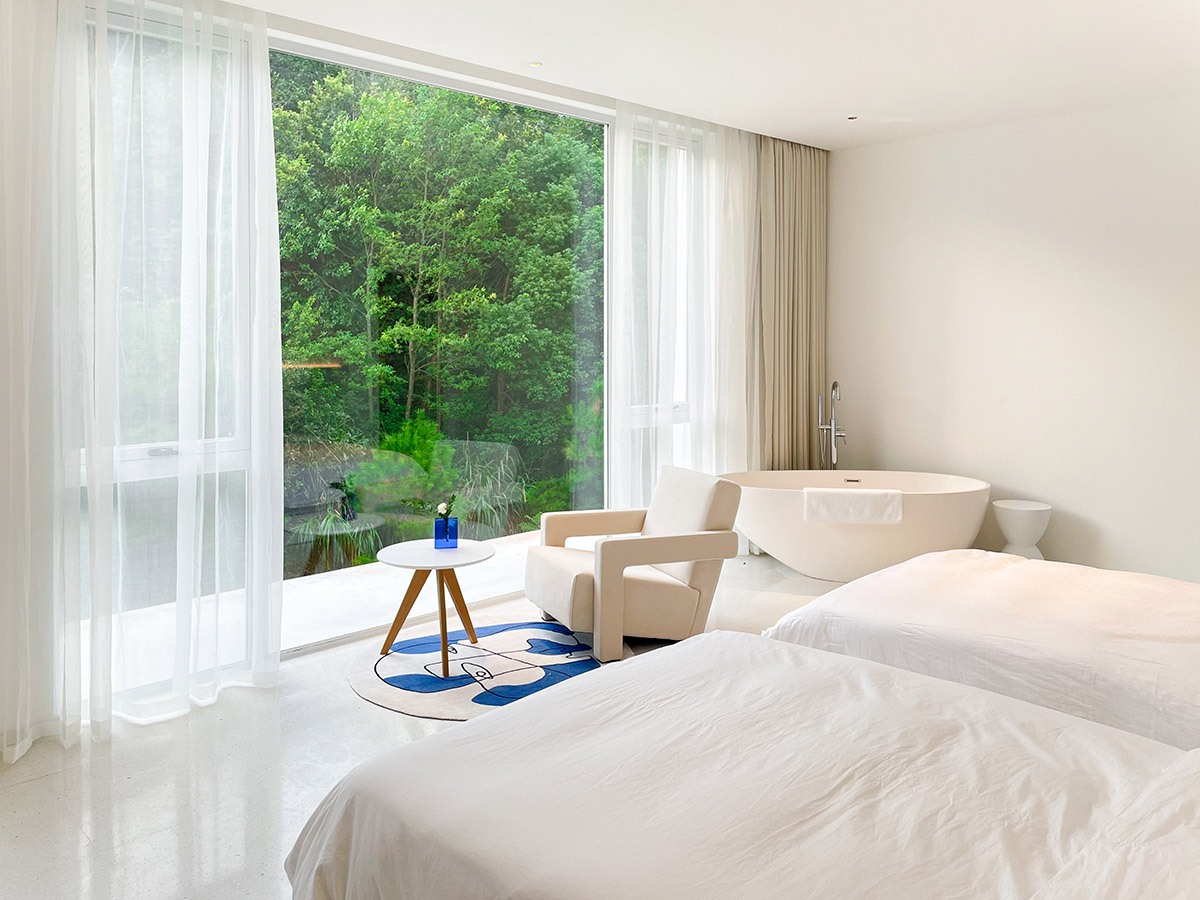 LQS Architects built boutique hotel featuring three-dimensional cut in Zhejiang Province