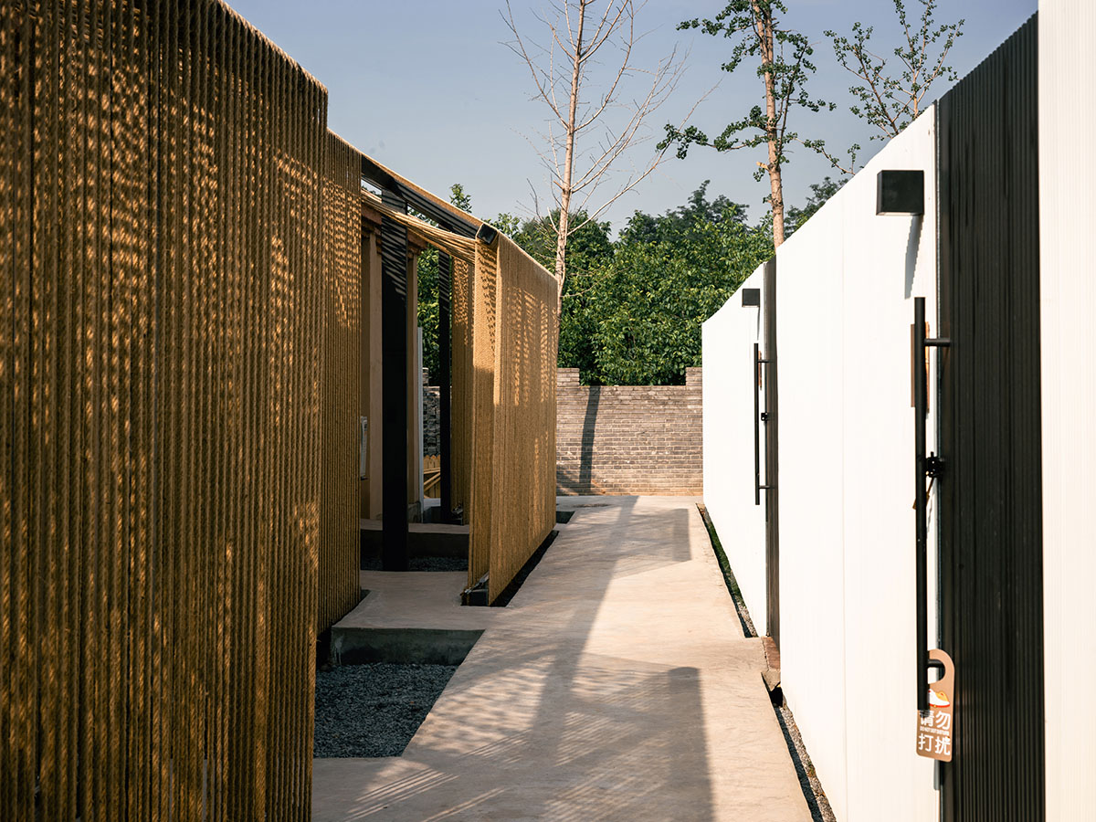 Domain Architects built boutique hotel with thatch roof and 60,000-metre hemp rope in rural Beijing