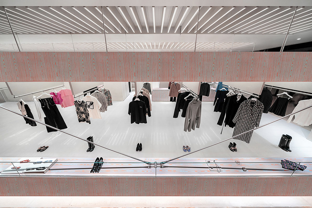 Various Associates creates show-like and pink-hued fashion store under a viaduct in Chongqing