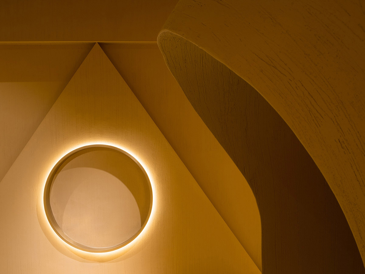 Angular corrugated stainless steel sheets form this showroom designed by PIG DESIGN in Hangzhou