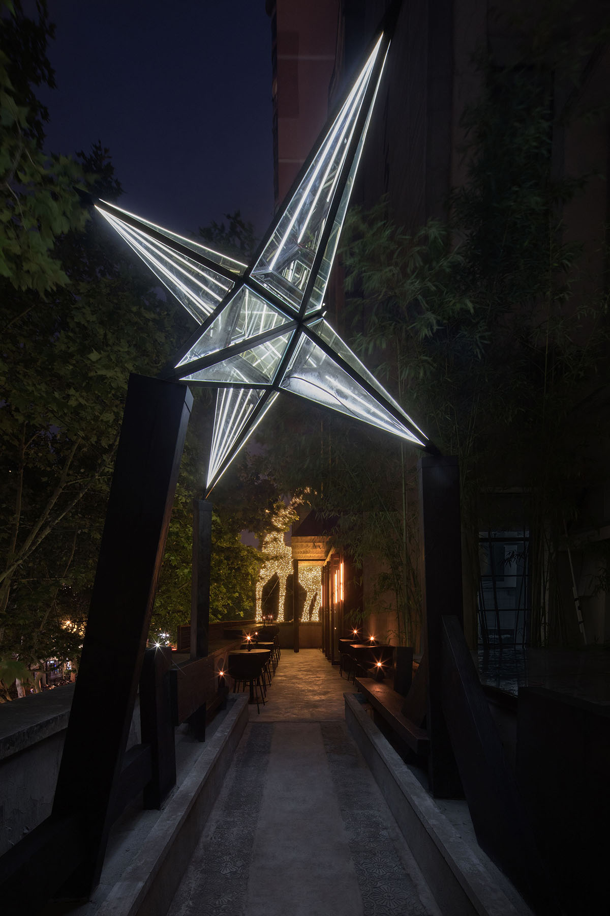 All Design Studio uses bold elements and soft lighting to create Lieben Bar in Shanghai