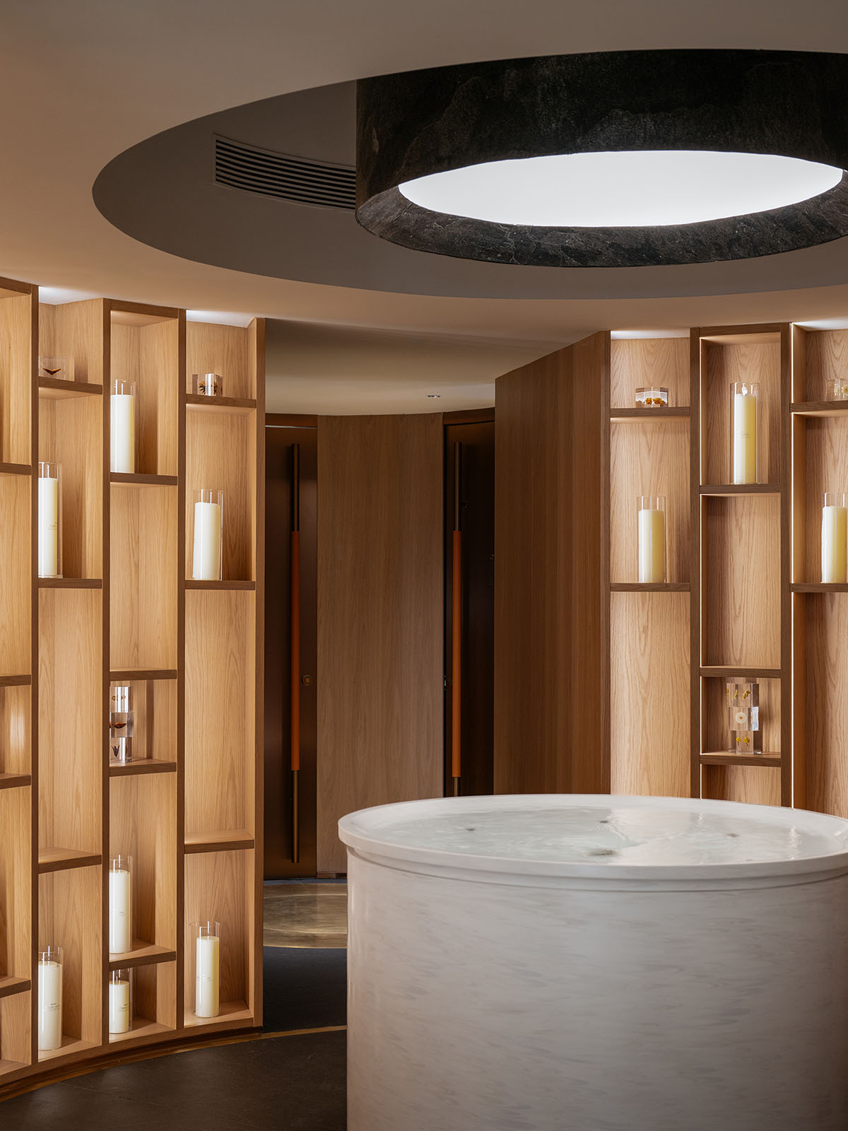 Undulating lines and expansive waves define interior of Orbit public exhibition hall in Shanghai 