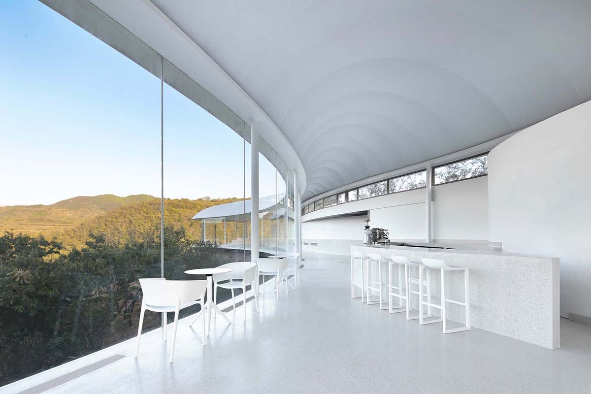 gad·line+ studio created could-like transparent and light reading space hovering in the mountains