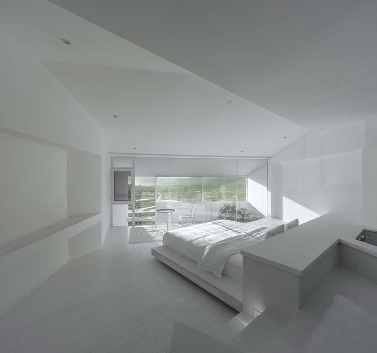 STUDIO QI reinterprets sequence of living conditions with tilted hotel on a hilly plot in China