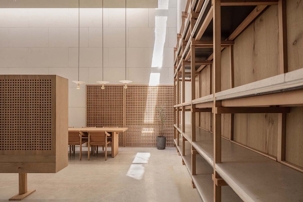 Waterfrom Design creates peaceful interior with wooden furnitures for tea community center in China