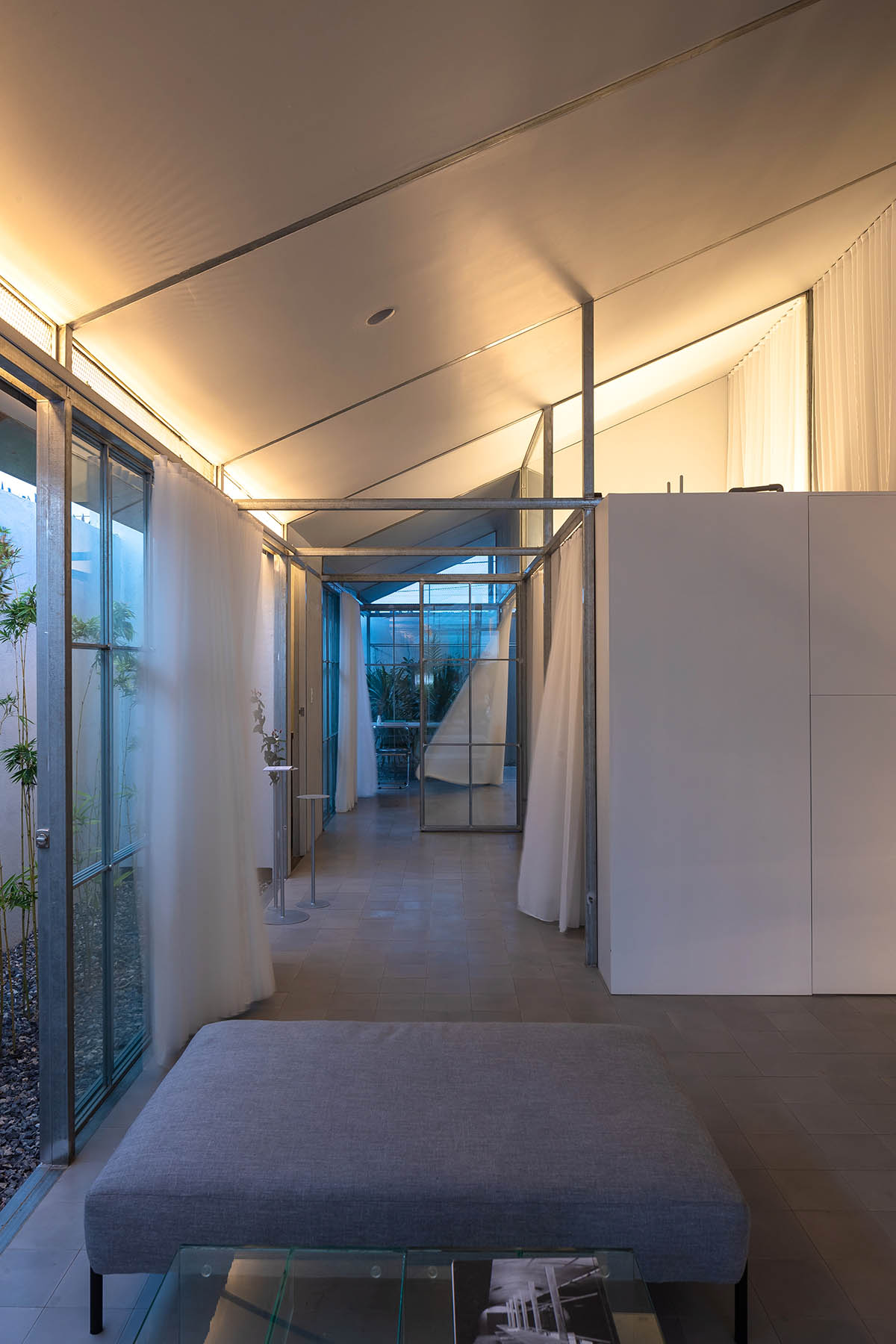 MIA Design Studio completes family house with angular roof in Vietnam 