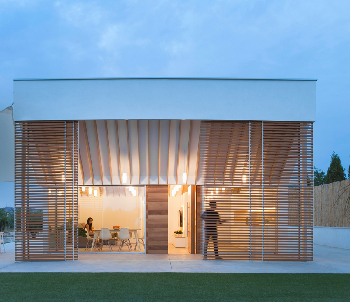 Pablo Muñoz Payá Arquitectos renovates former house with wooden shutters in Spain