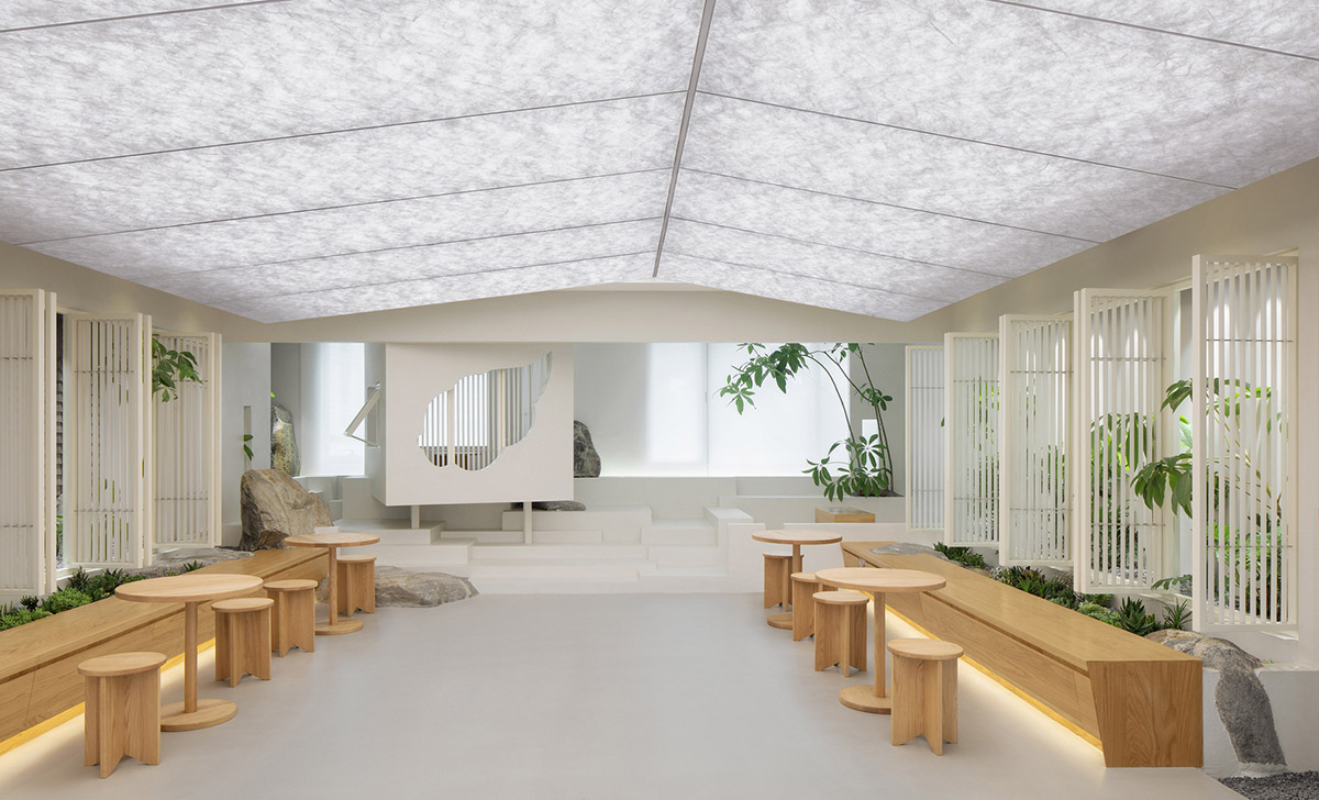 Jiejie studio wraps this tea room with a peach garden with rocky and forest landscape in Beijing