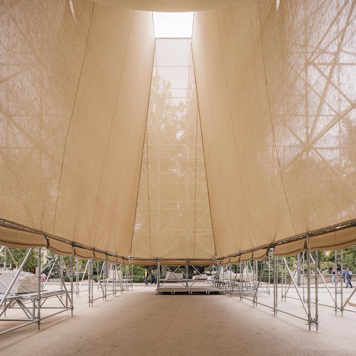 Aire Pavilion wrapped by giant scaffolding represents 