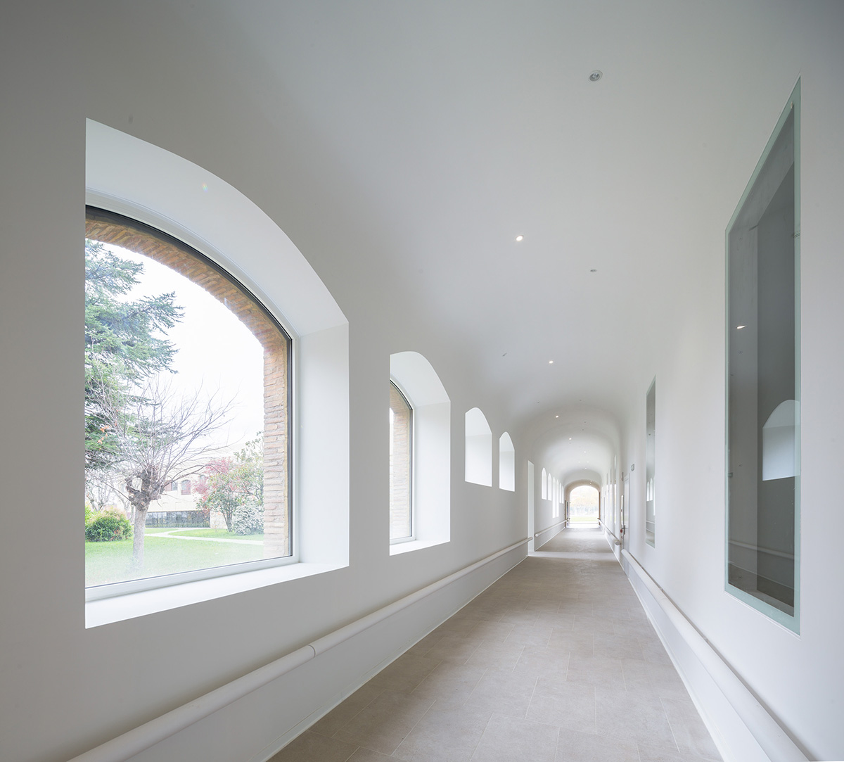 Vaillo+Irigaray Architects' pavilion-like Psychiatric Center is dissolved within historic buildings