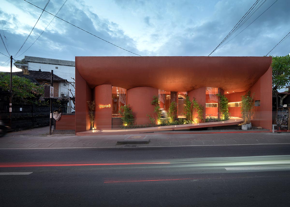 Arti Design Studio creates red arched walls to provide different seating experience in Indonesia 