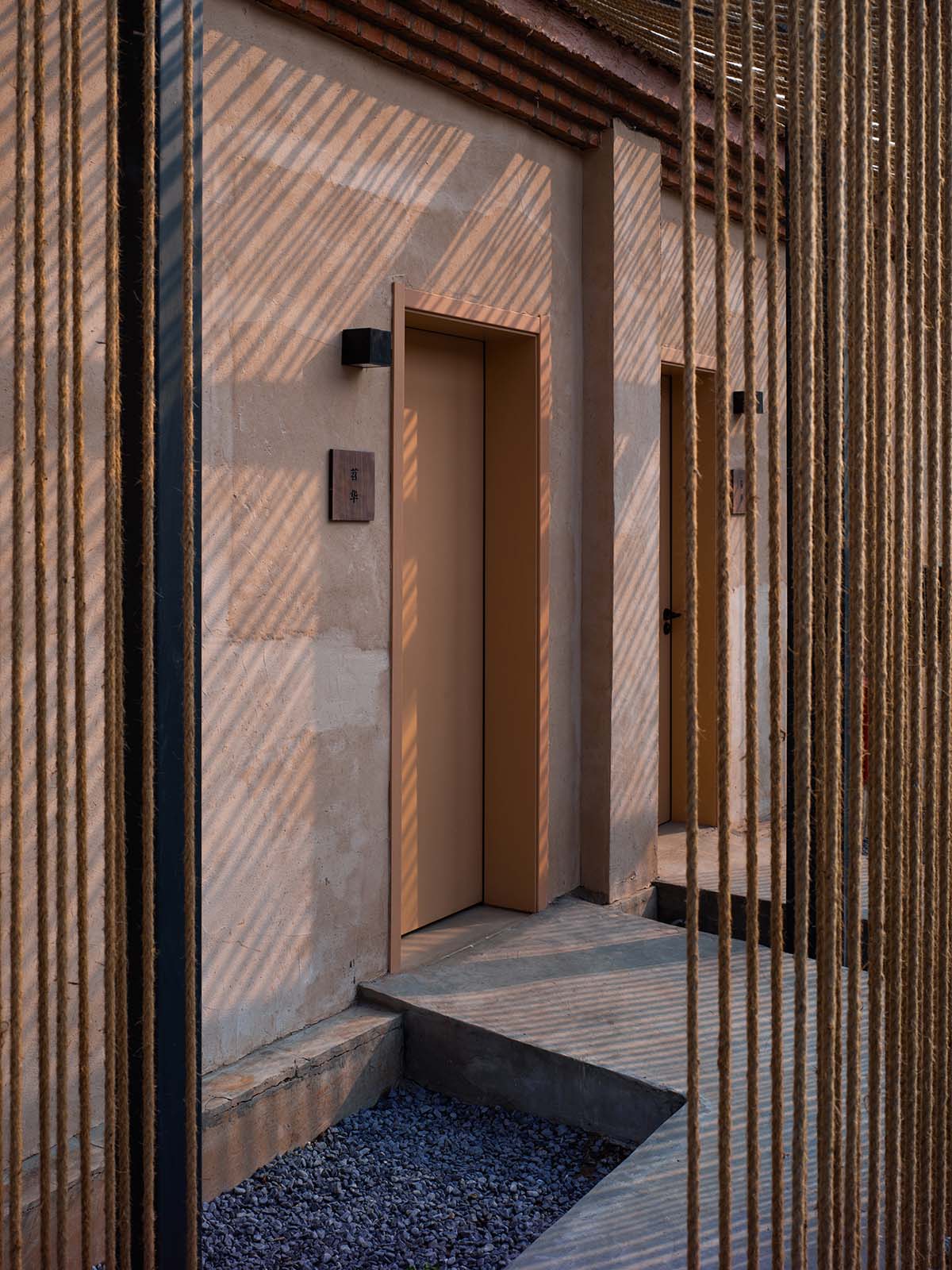 Domain Architects built boutique hotel with thatch roof and 60,000-metre hemp rope in rural Beijing