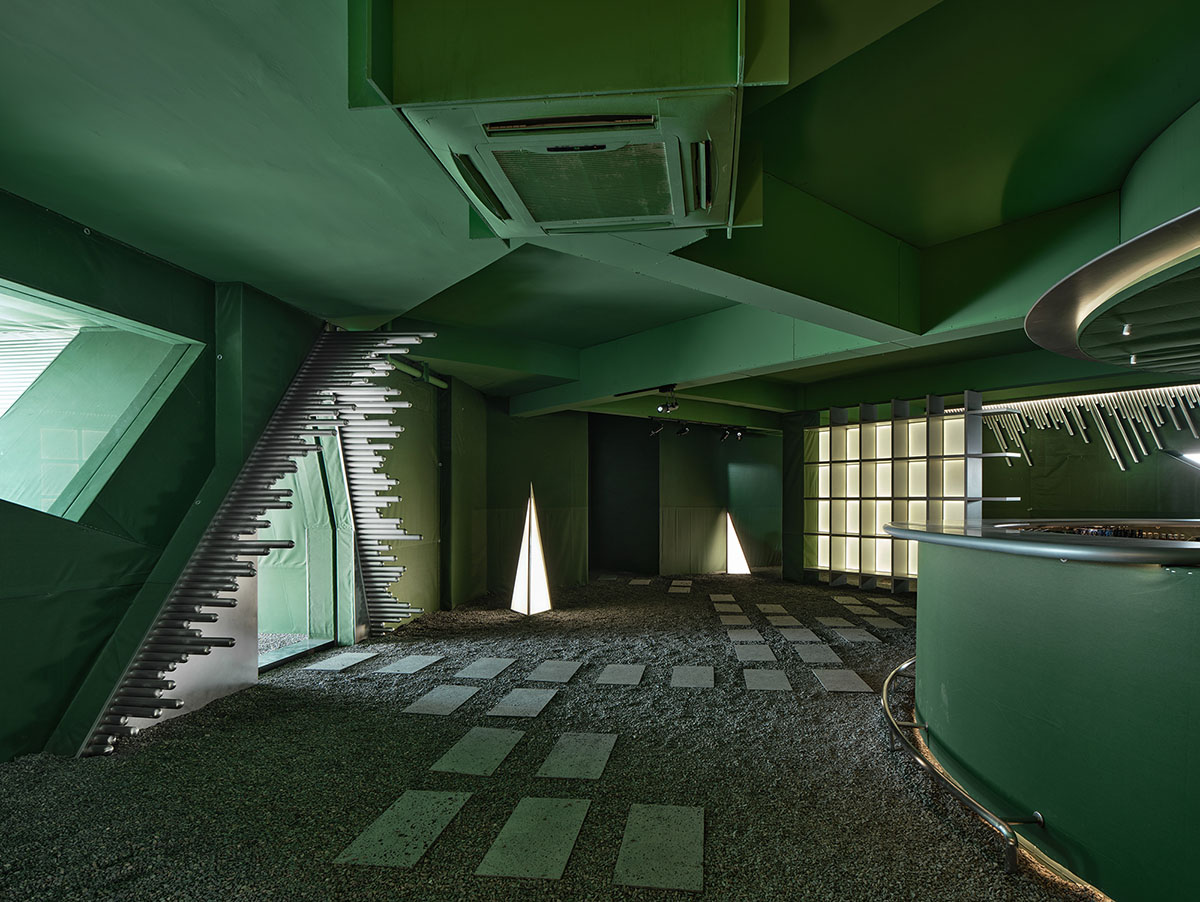 PIG DESIGN completes art space with recycled materials and green-colored furniture pieces in China 