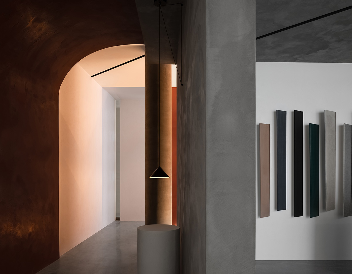 JG Phoenix creates paint-like interiors harmonized with geometric cut-outs for showroom in China