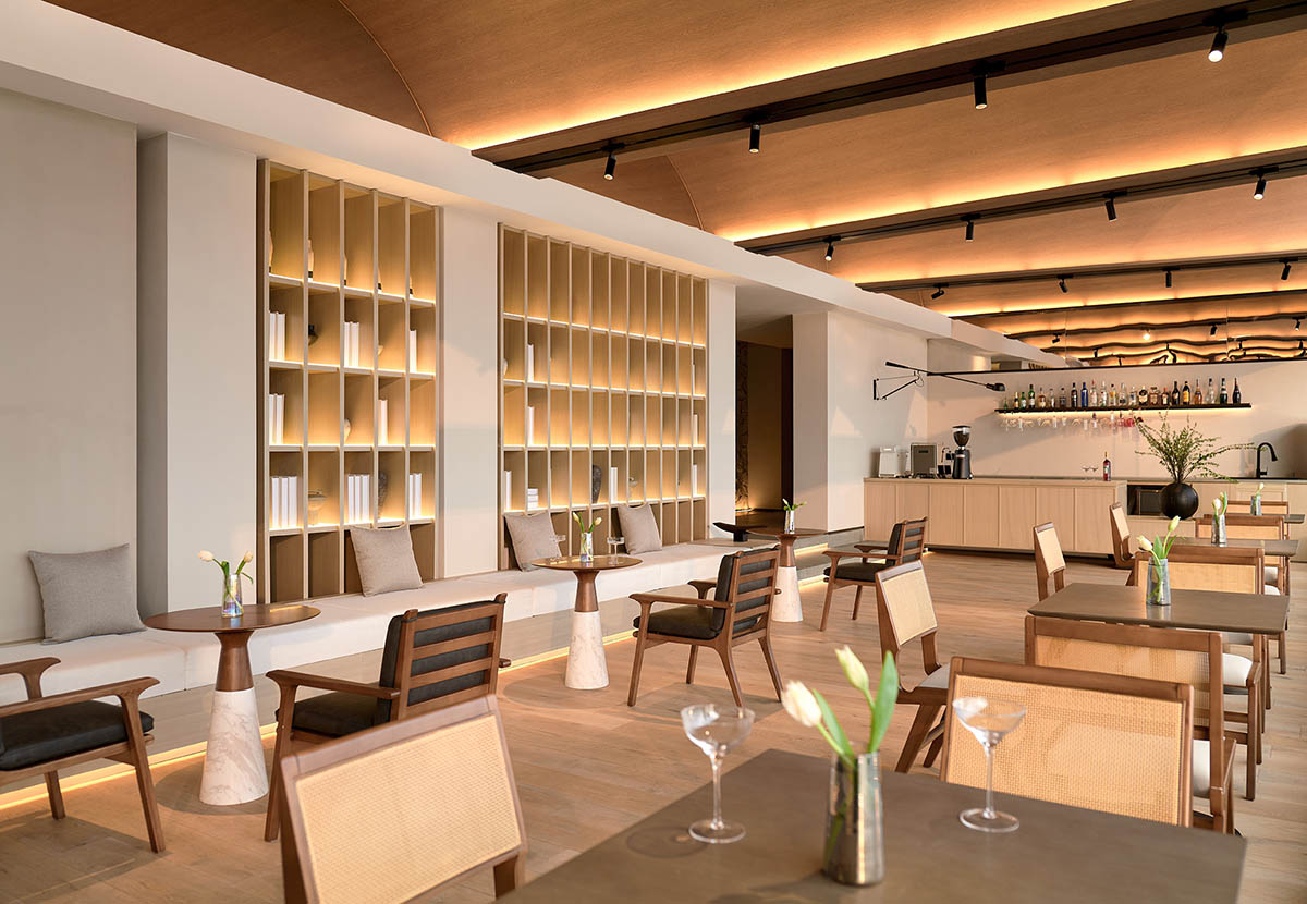 WJ STUDIO completes interiors of vaulted-roof Boatyard Hotel towards the river in Suzhou